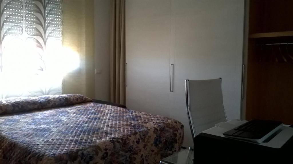 Postel nebo postele na pokoji v ubytování A casa con Stefania