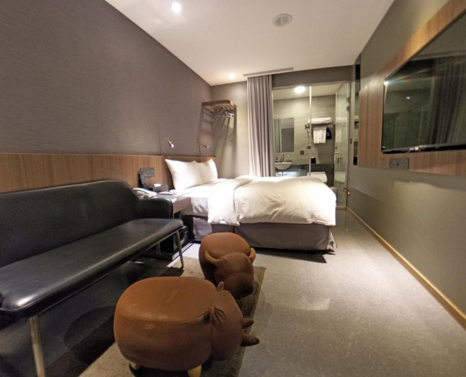 Postel nebo postele na pokoji v ubytování Beauty Hotels Taipei - B7 Journey
