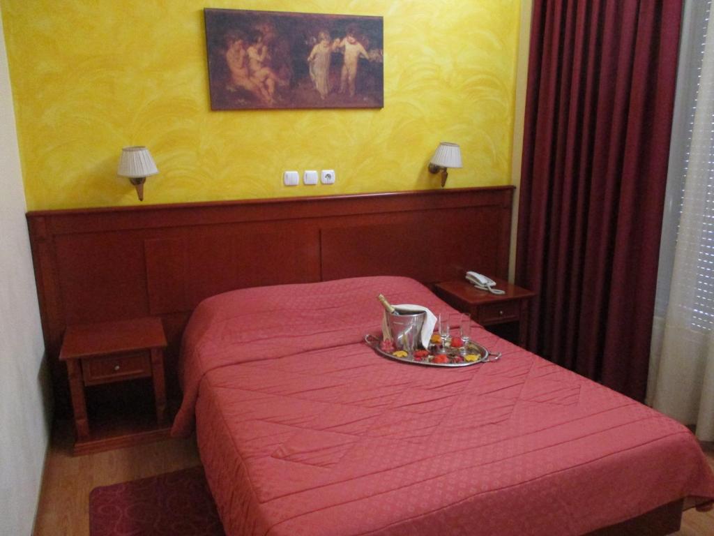 Postel nebo postele na pokoji v ubytování Hotel Delta