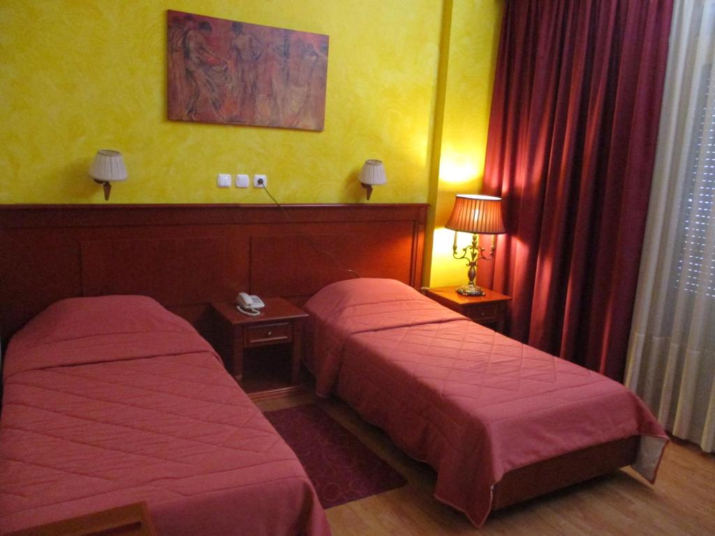 Postel nebo postele na pokoji v ubytování Hotel Delta