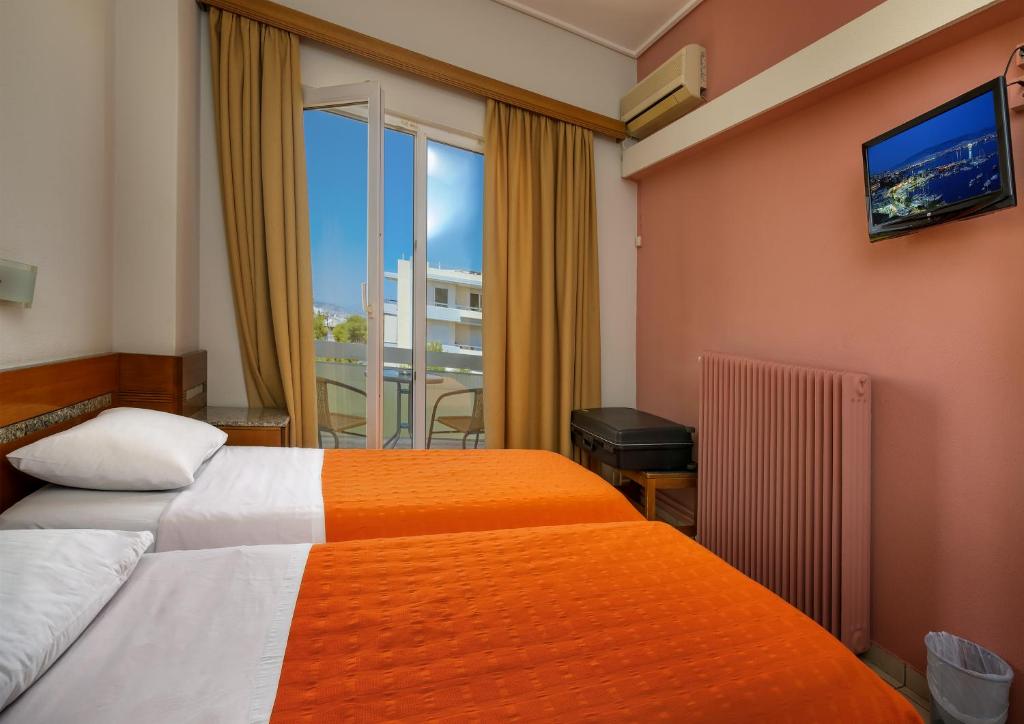 Llit o llits en una habitació de Park Hotel