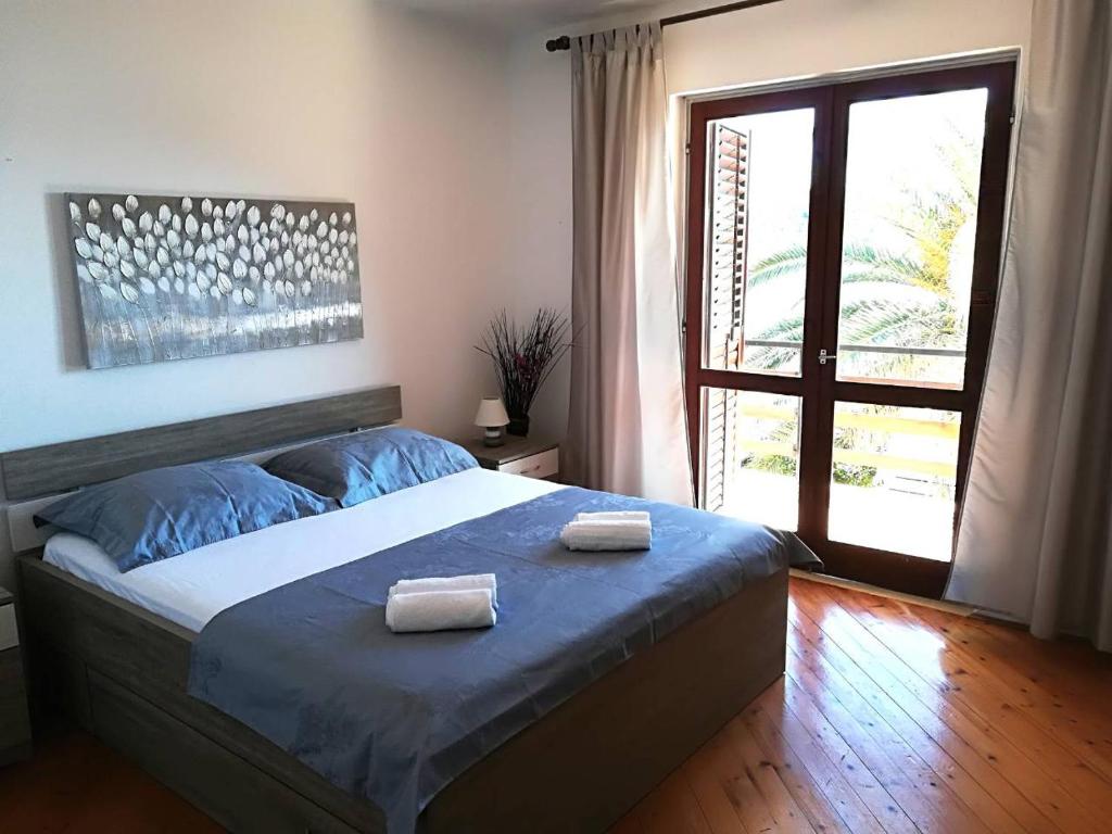Кровать или кровати в номере Guest House Matana