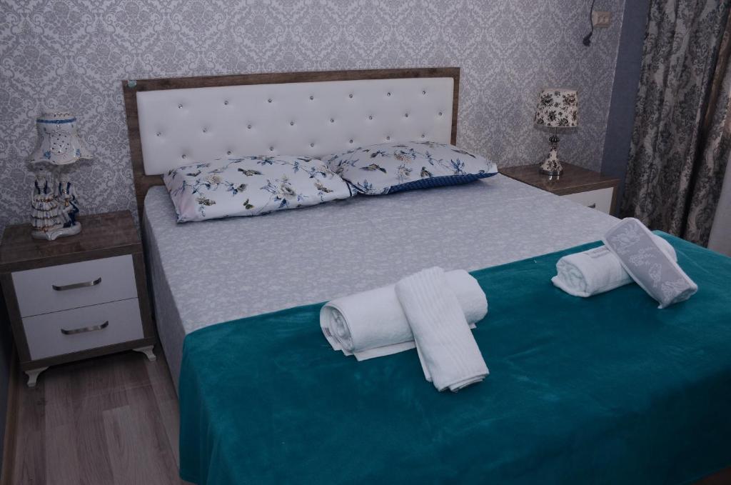 Postel nebo postele na pokoji v ubytování Nana's House