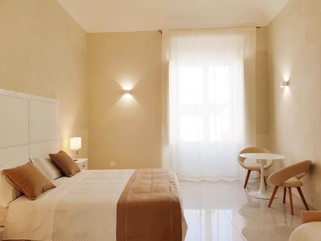 Posteľ alebo postele v izbe v ubytovaní B&B Via Cavour 32