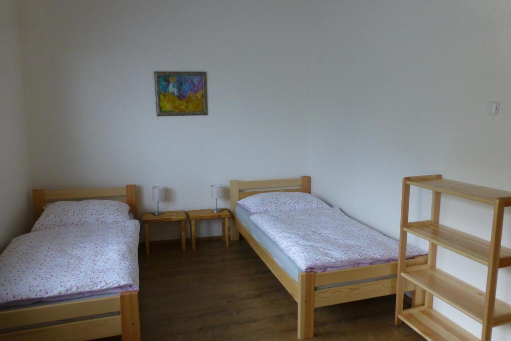 Postel nebo postele na pokoji v ubytování Pod Králičím vrchem
