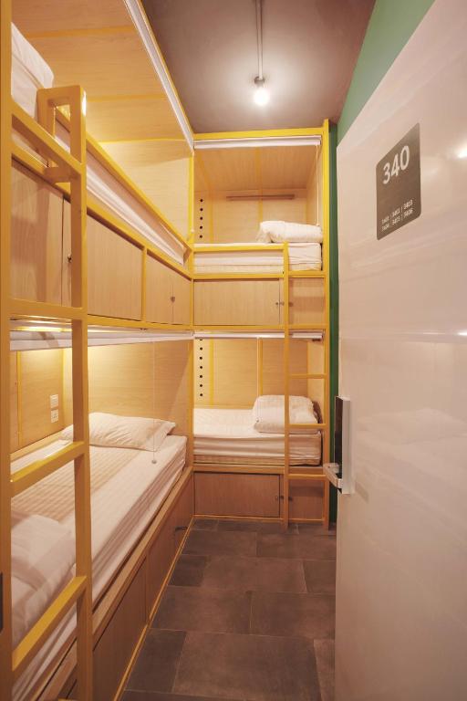 Postel nebo postele na pokoji v ubytování Konko Hostel Jakarta