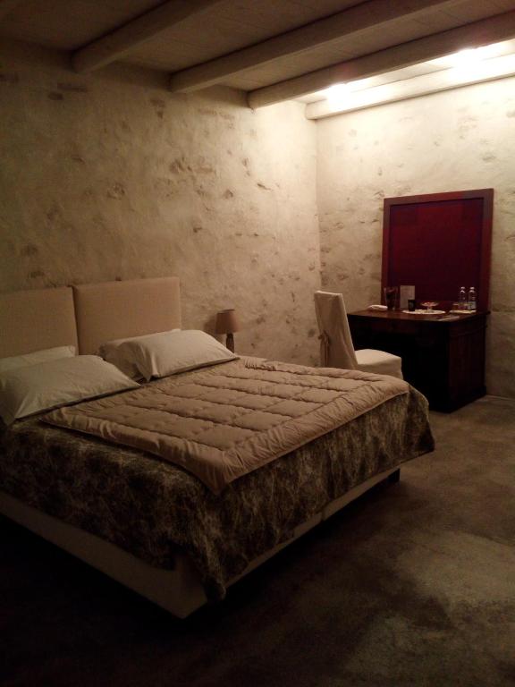 Postel nebo postele na pokoji v ubytování Casa Torre Allera