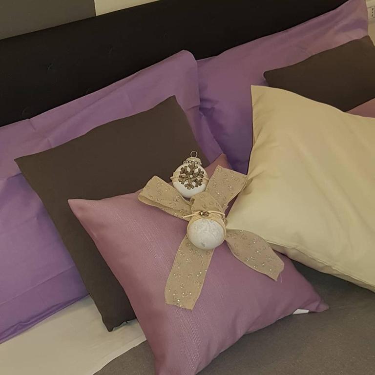 Postel nebo postele na pokoji v ubytování Il Quadrifoglio guesthouse