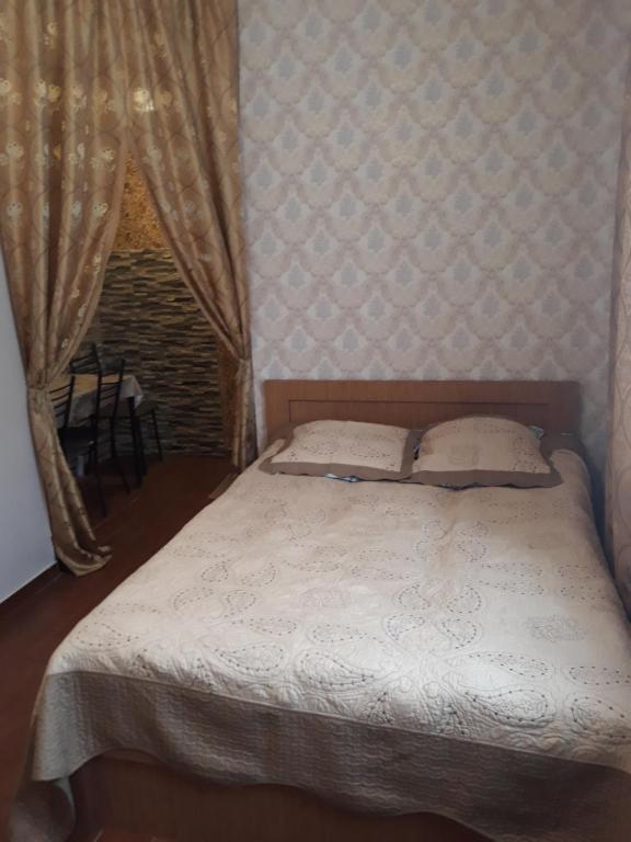 Postel nebo postele na pokoji v ubytování Guesthouse Gia