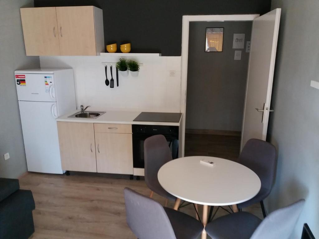 Kuchyň nebo kuchyňský kout v ubytování Apartments Danijela