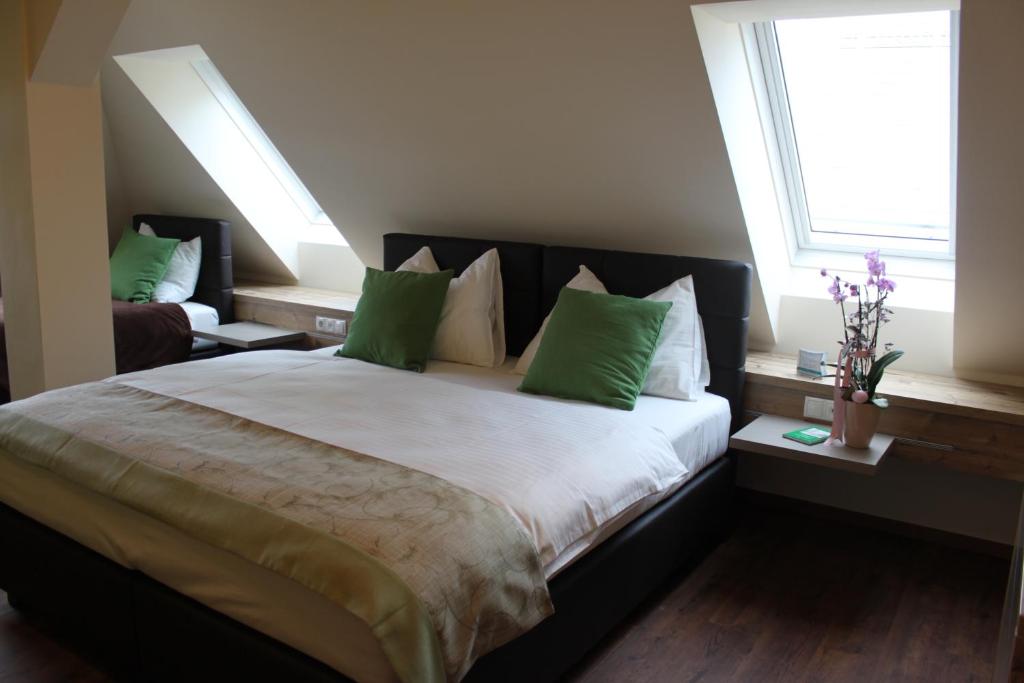 Postel nebo postele na pokoji v ubytování Hotel Braun