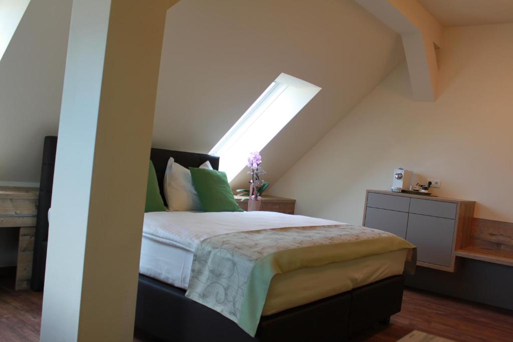 Postel nebo postele na pokoji v ubytování Hotel Braun