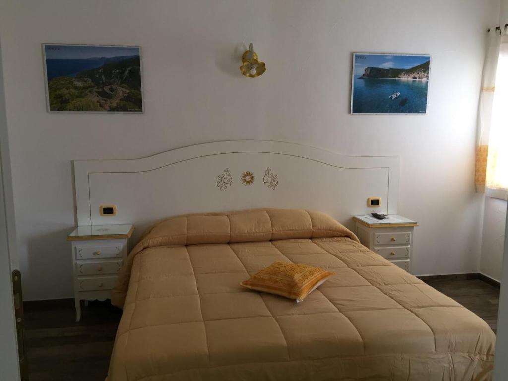 Postel nebo postele na pokoji v ubytování B&B da Miranna