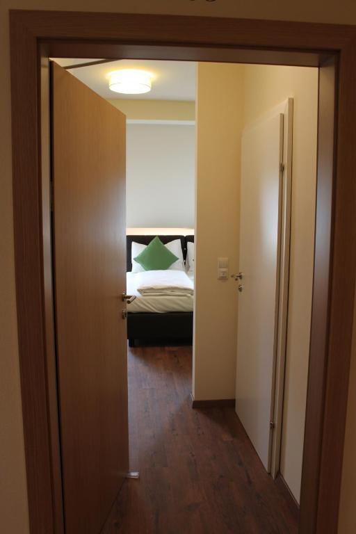 Postel nebo postele na pokoji v ubytování Hotel Braun