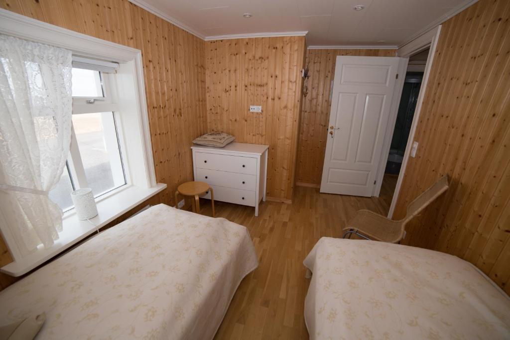 Postel nebo postele na pokoji v ubytování Gamla Rif