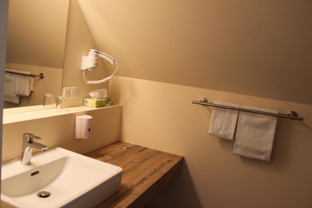 Koupelna v ubytování Hotel Braun