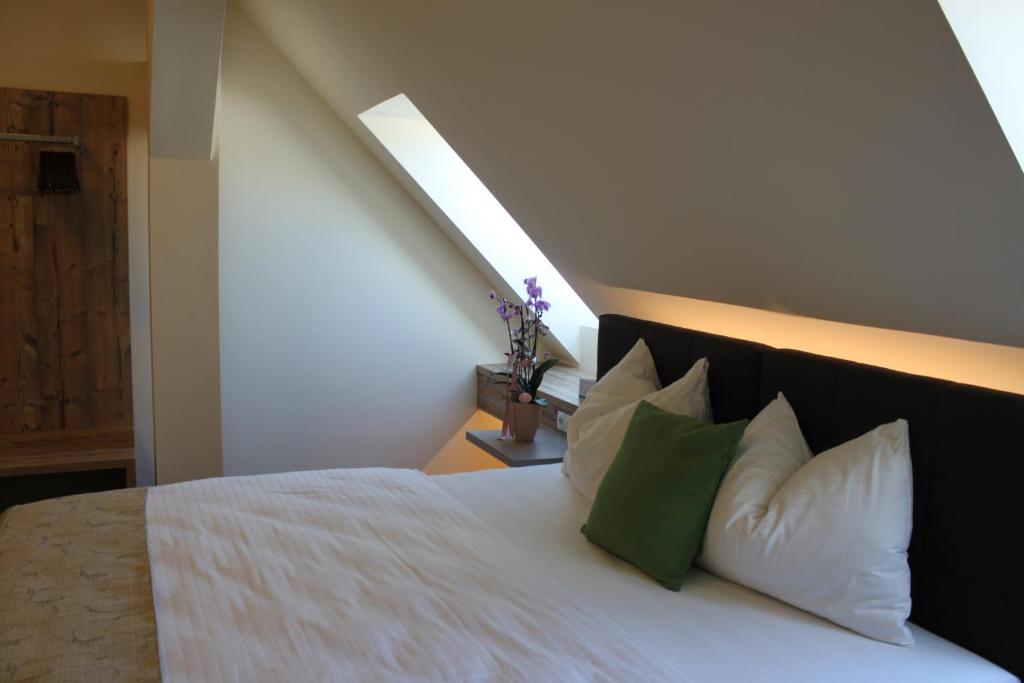 Postel nebo postele na pokoji v ubytování Hotel Braun
