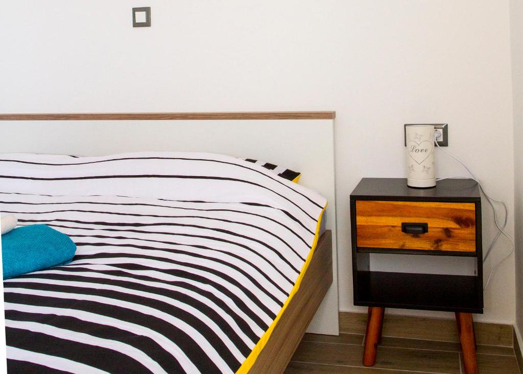 Postel nebo postele na pokoji v ubytování Apartment Punta