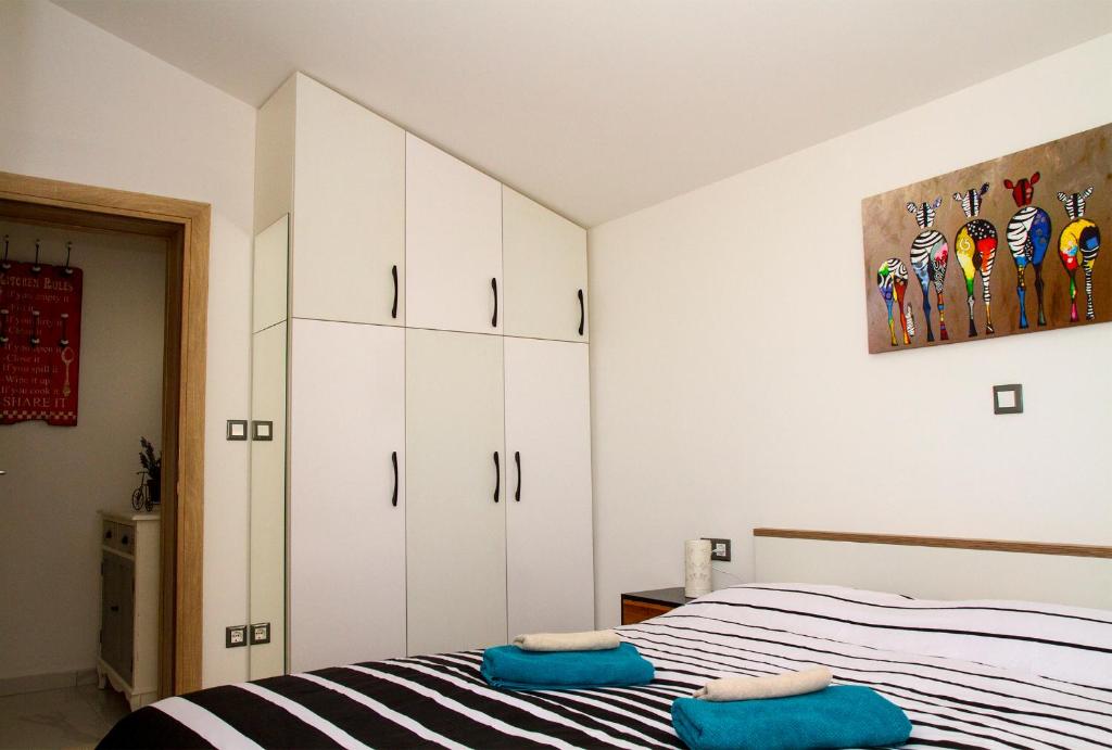 Postel nebo postele na pokoji v ubytování Apartment Punta