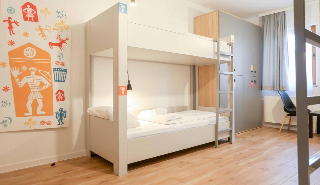 Postel nebo postele na pokoji v ubytování Hostel Kucha