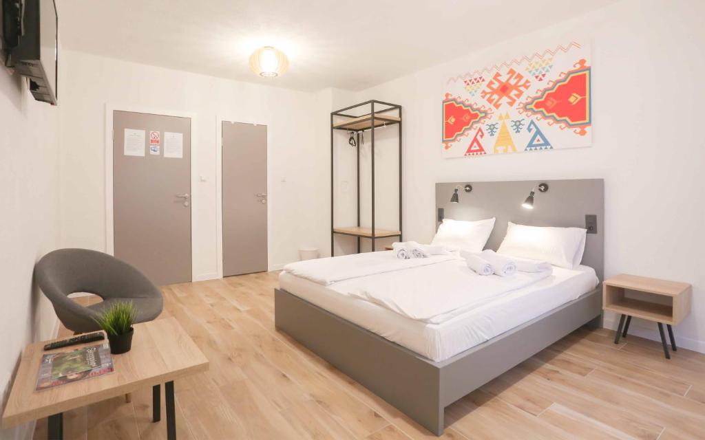 Postel nebo postele na pokoji v ubytování Hostel Kucha