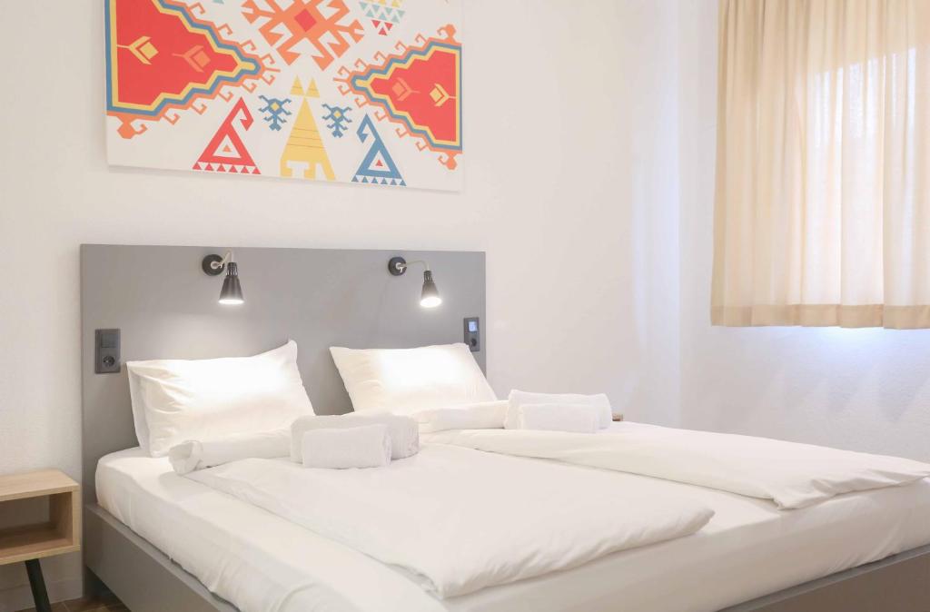 Postel nebo postele na pokoji v ubytování Hostel Kucha