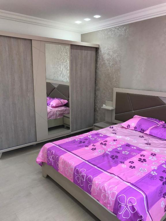 Postel nebo postele na pokoji v ubytování Dar lotfi