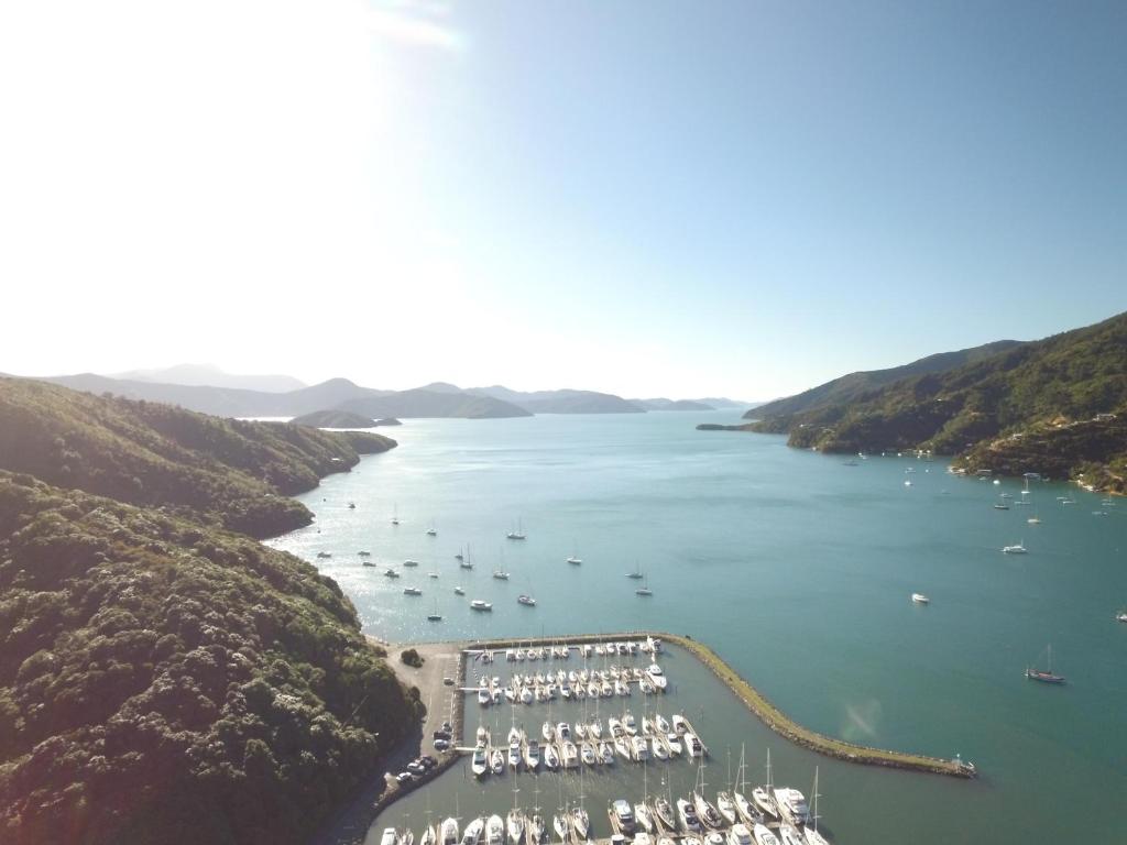 an aerial view of a harbor with boats in the water at Dons Place in Waikawa