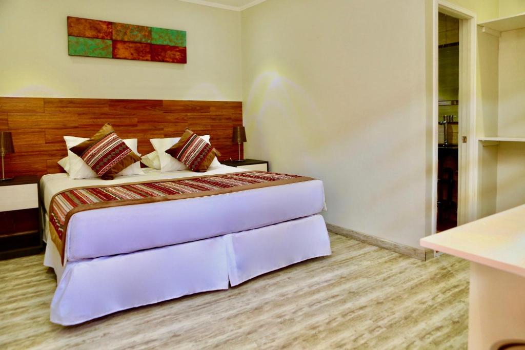 Postel nebo postele na pokoji v ubytování Yakana Hotel