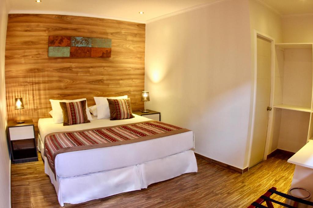 Postel nebo postele na pokoji v ubytování Yakana Hotel