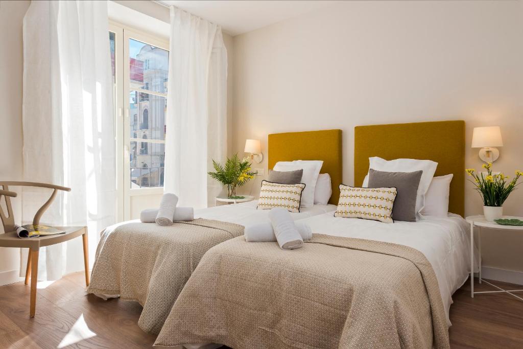 Posteľ alebo postele v izbe v ubytovaní Genteel Home Picasso