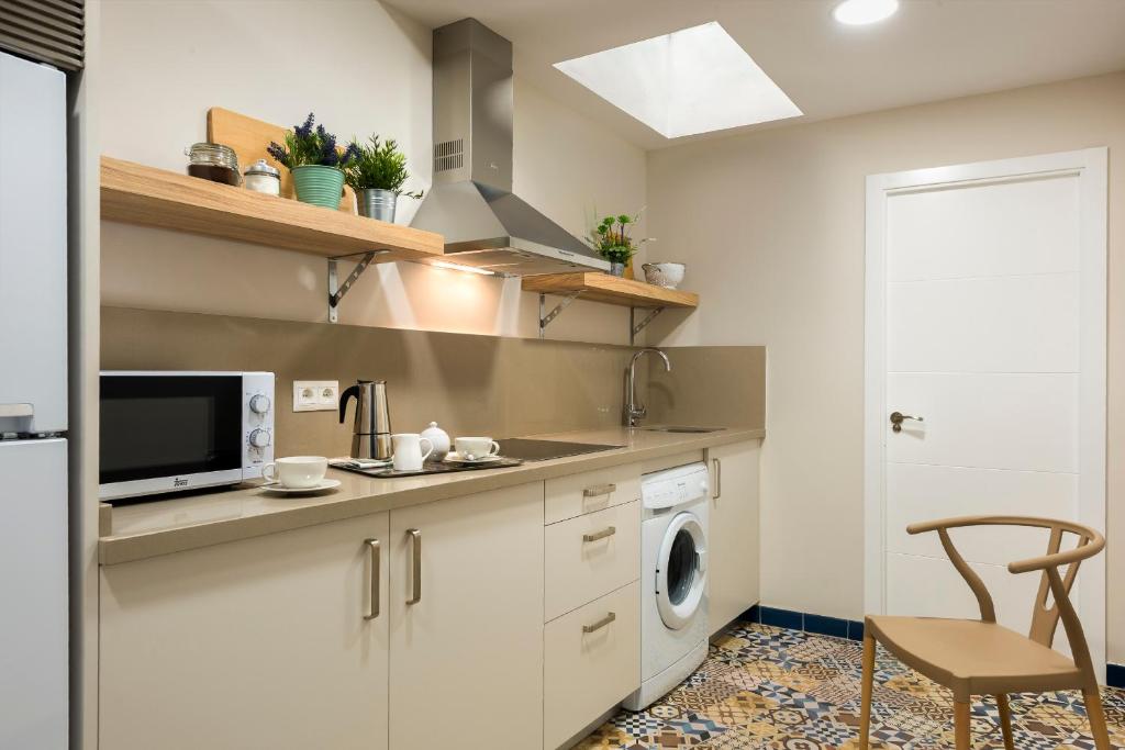 Kuchyňa alebo kuchynka v ubytovaní Genteel Home Picasso