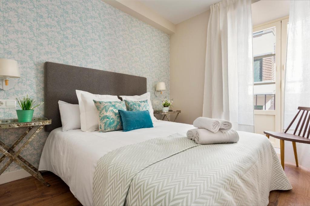 Posteľ alebo postele v izbe v ubytovaní Genteel Home Picasso
