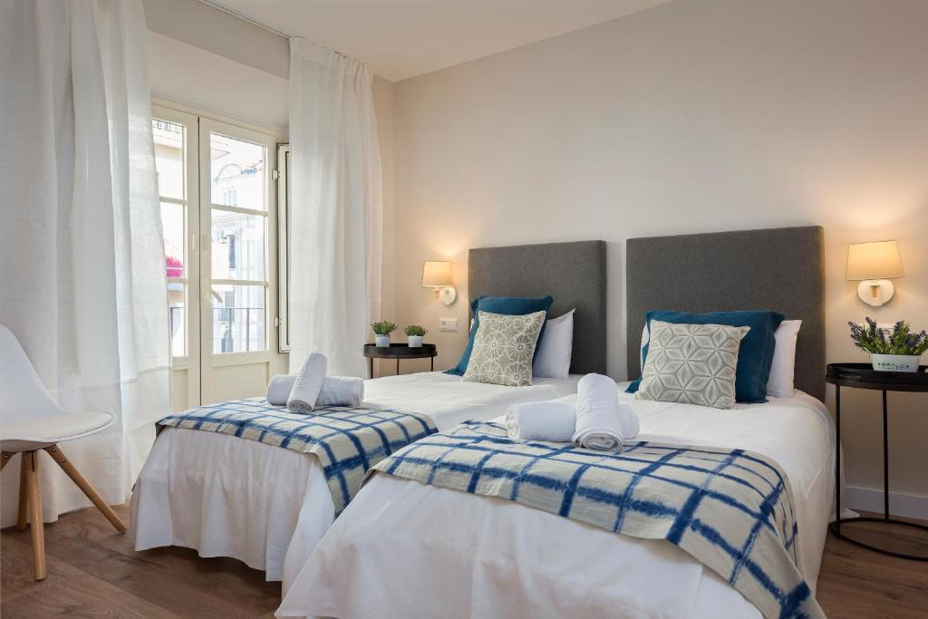 Posteľ alebo postele v izbe v ubytovaní Genteel Home Picasso