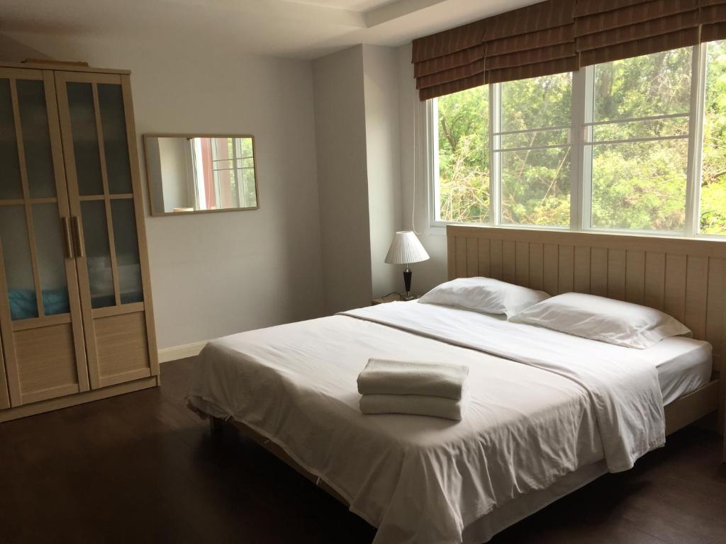 Postel nebo postele na pokoji v ubytování Jomtien Beach Penthouses Condo