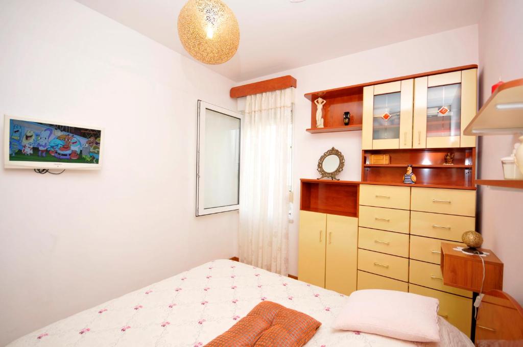 Posteľ alebo postele v izbe v ubytovaní Apartment Poetry