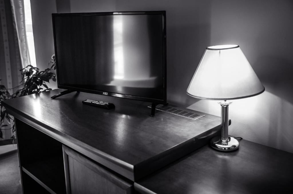 TV a/nebo společenská místnost v ubytování Hotel Seven