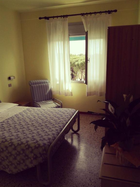 Postel nebo postele na pokoji v ubytování Hotel Senio
