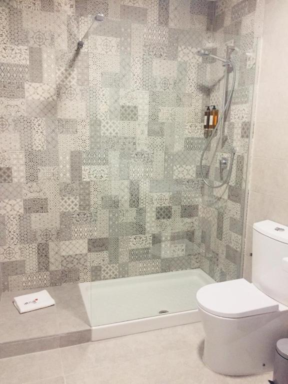Koupelna v ubytování Apartamentos Core Suite Sevilla