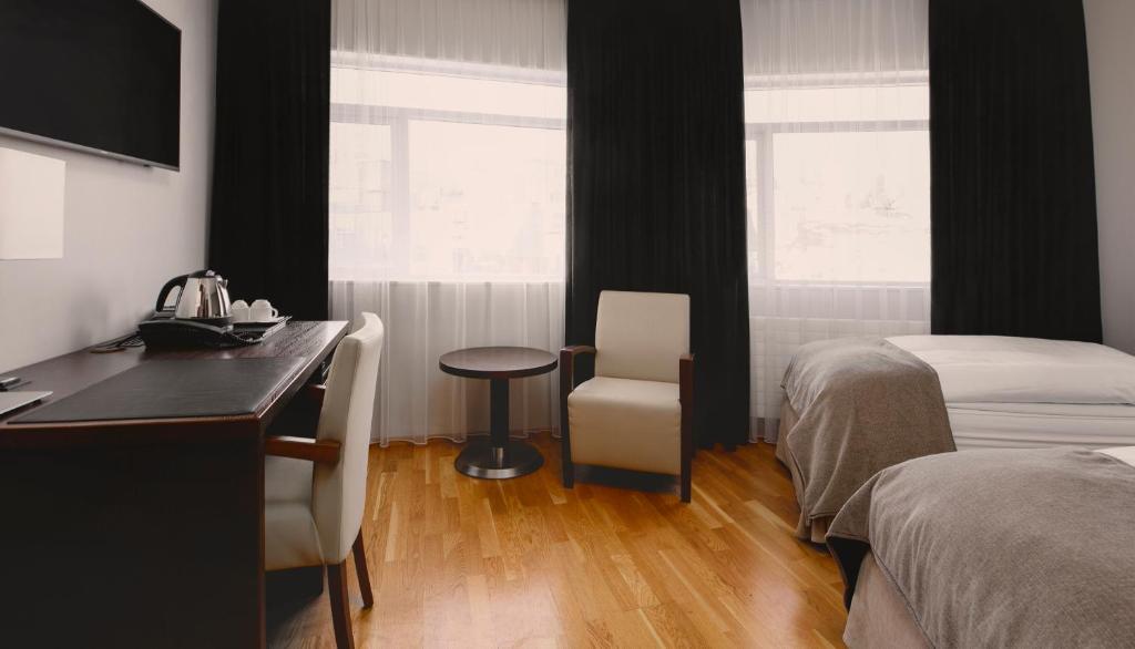Postel nebo postele na pokoji v ubytování Hotel Kea by Keahotels