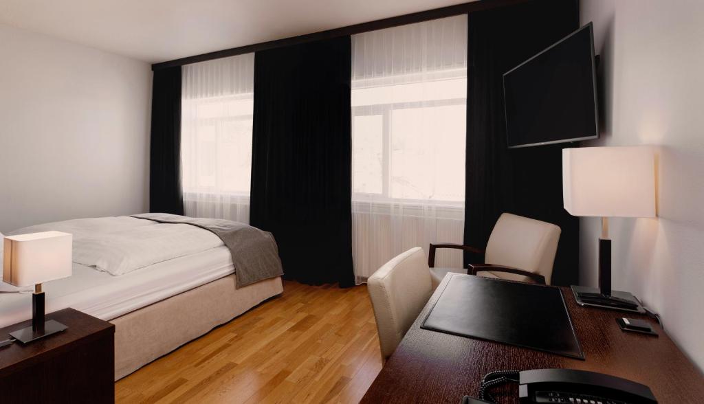 Postel nebo postele na pokoji v ubytování Hotel Kea by Keahotels