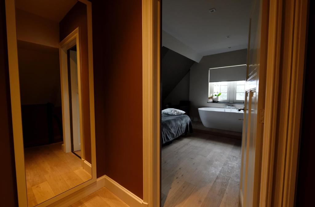 Postel nebo postele na pokoji v ubytování Maison Stout