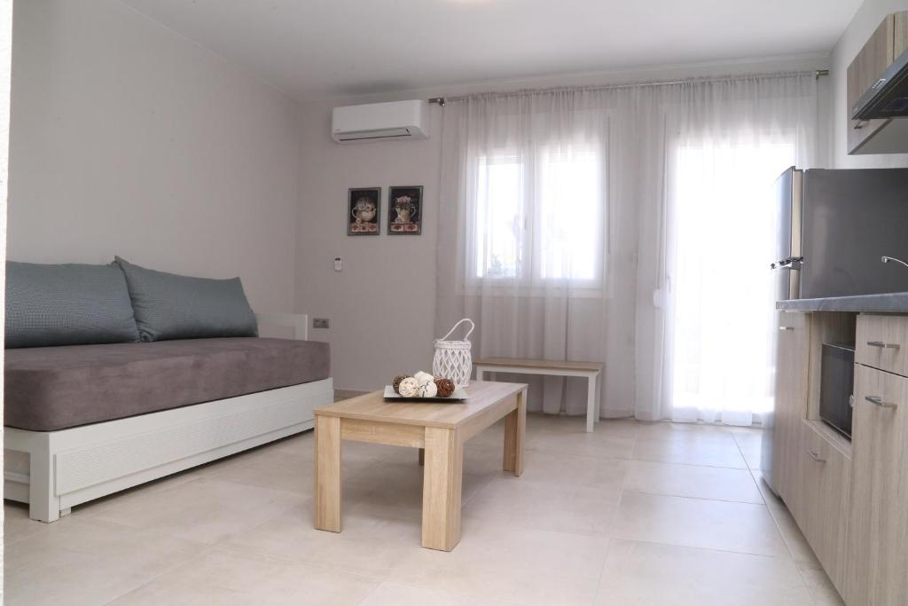 TV a/nebo společenská místnost v ubytování R&K Suites