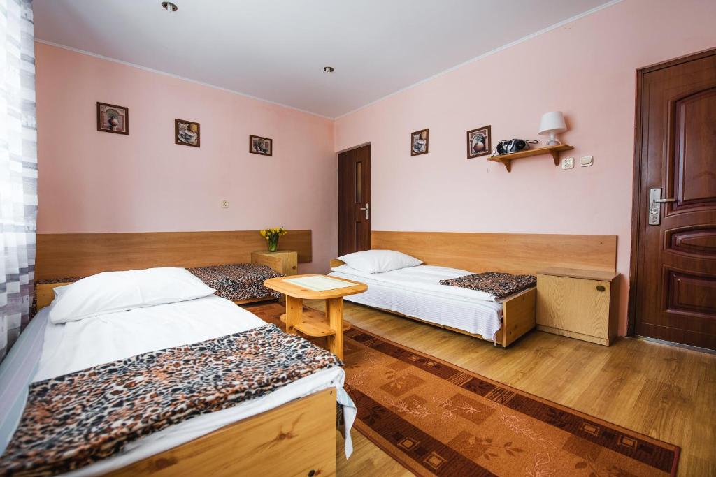 Posteľ alebo postele v izbe v ubytovaní Bukowianka