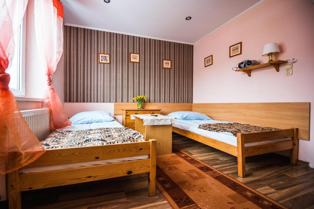 Posteľ alebo postele v izbe v ubytovaní Bukowianka