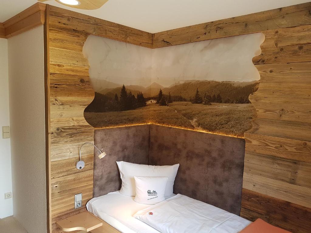 Postel nebo postele na pokoji v ubytování Hotel und Restaurant Köhlerhütte - Fürstenbrunn