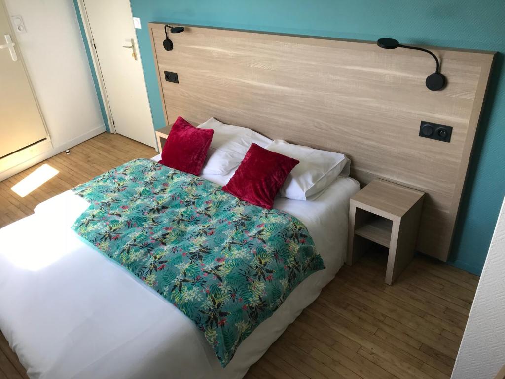 Postel nebo postele na pokoji v ubytování Hôtel Restaurant L'Escale d'en Arz