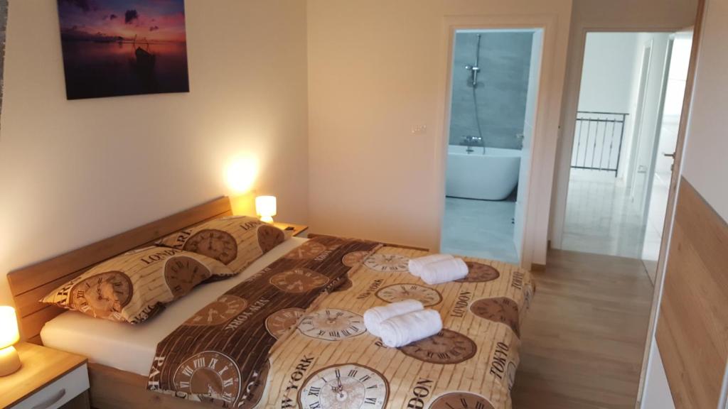 Postel nebo postele na pokoji v ubytování Villa Martina