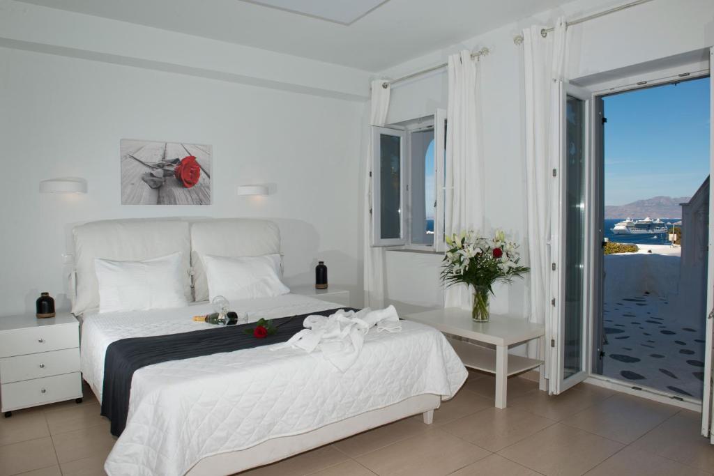 Postel nebo postele na pokoji v ubytování Zannis Hotel