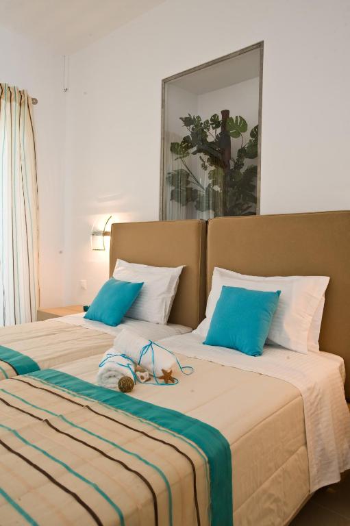 Postel nebo postele na pokoji v ubytování Zannis Hotel